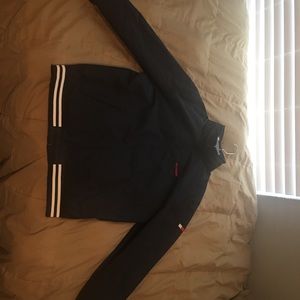 Brand New never worn. Has a hood inside